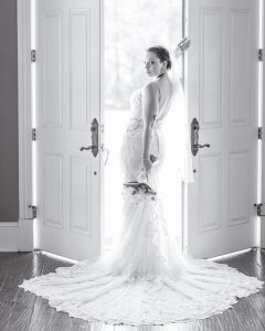 Hannah modeling in a wedding gown