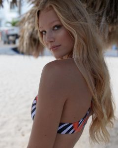 modeling side profile shot of April on the beach