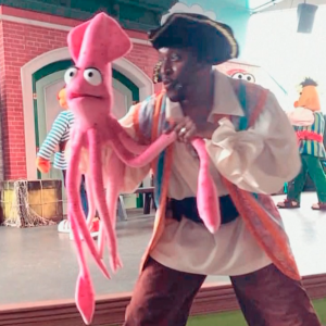 Charles performing on stage at Sesame Place