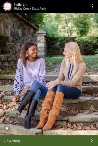 Jordyn modeling with another model outside in fall fashion for Lisi Lerch