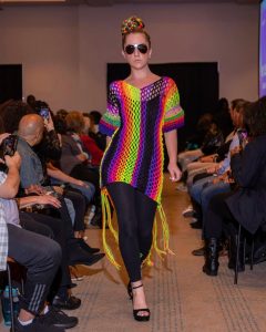 Natalie walking on the runway at the Autism Awareness Fashion Show