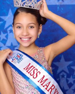 Teagan wearing her sash and crown as Little Miss Maryland