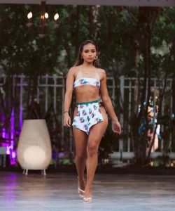 Ximena walking in a swimsuit on the runway