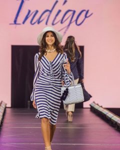 Francesca walking on the runway in Winter Park Fashion Week