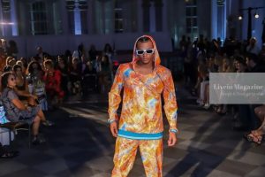 Kentin posing on the runway in a fashion outfit at NYFW