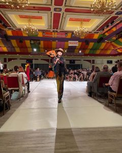 Olivia walking on the runway at ACFW