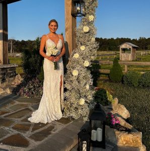 Alexis modeling in a bridal gown at the bridal event