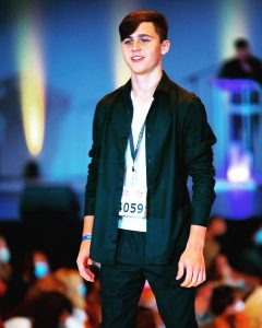 Cole Jackson modeling and posing on the runway