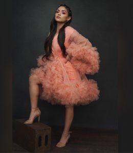 Abilene modeling in a ballerina type dress