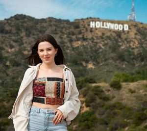 Alyssa posing in the front of the Hollywood sign