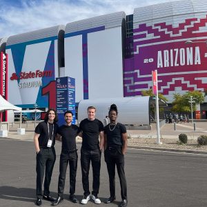 Andrew, Landon, Keegan, & DeShawn outside of the football stadium