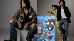 shots of Victor modeling including seated and standing next to an art piece