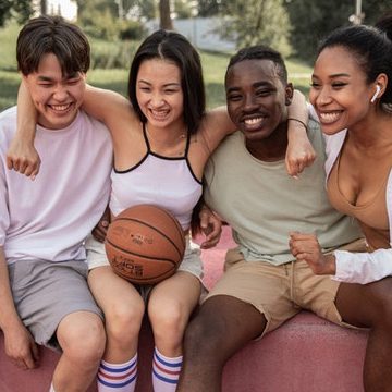 group of teens smiling and laughing